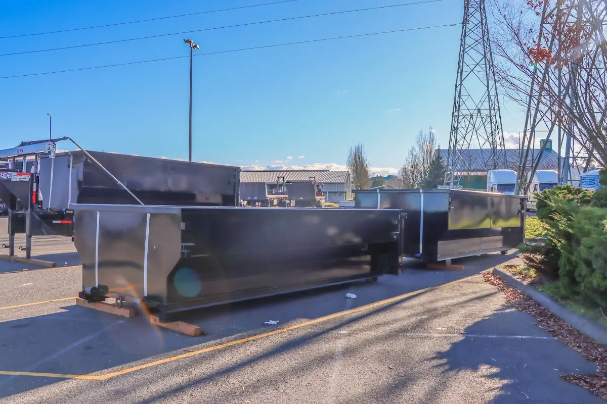 Roll-off dumpster ready for waste disposal at job site for 2 Yard Dumpster Rental in Passaic
